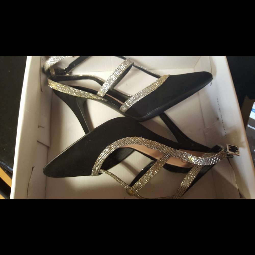 These are Black ,gold & silver suede